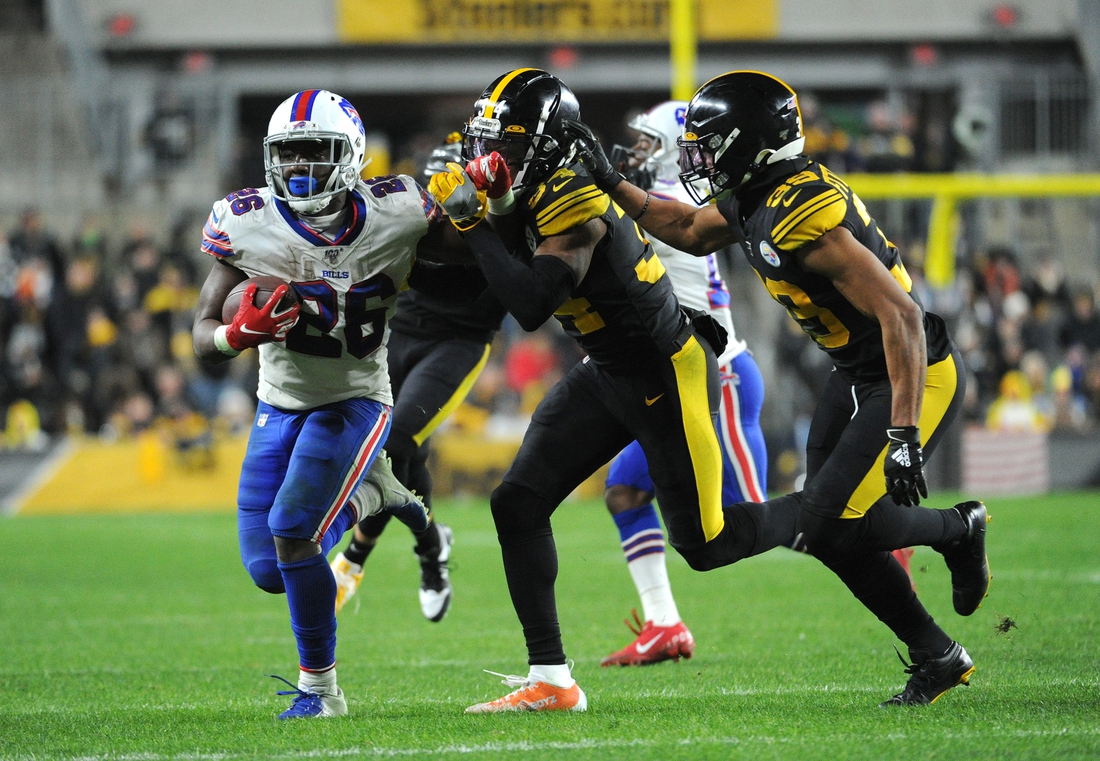 Dec 15, 2019; Pittsburgh, PA, USA; Buffalo Bills running back Devin Singletary (26) against Pittsburgh Steelers safety Terrell Edmunds (34) during the fourth quarter at Heinz Field. The Steelers lost 17-10. Mandatory Credit: Philip G. Pavely-USA TODAY Sports
