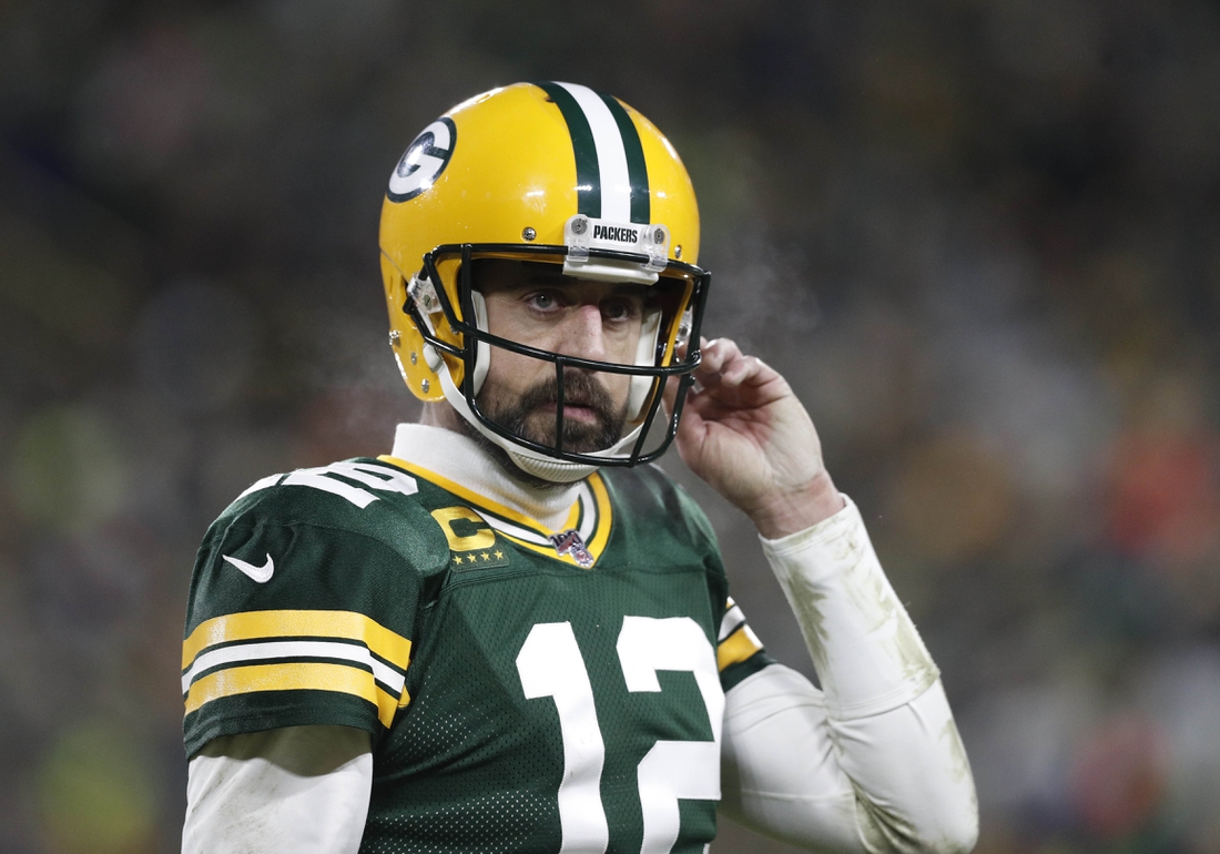 Jan 12, 2020; Green Bay, WI, USA; Green Bay Packers quarterback Aaron Rodgers reacts against the Seattle Seahawks in the fourth quarter of a NFC Divisional Round playoff football game at Lambeau Field. Mandatory Credit: Jeff Hanisch-USA TODAY Sports