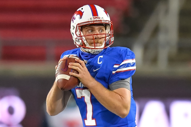 Oct 24, 2020; Dallas, Texas, USA; Southern Methodist Mustangs quarterback Shane Buechele (7) looks down field against the Cincinnati Bearcats during the second half at Gerald J. Ford Stadium. Mandatory Credit: Tim Flores-USA TODAY Sports