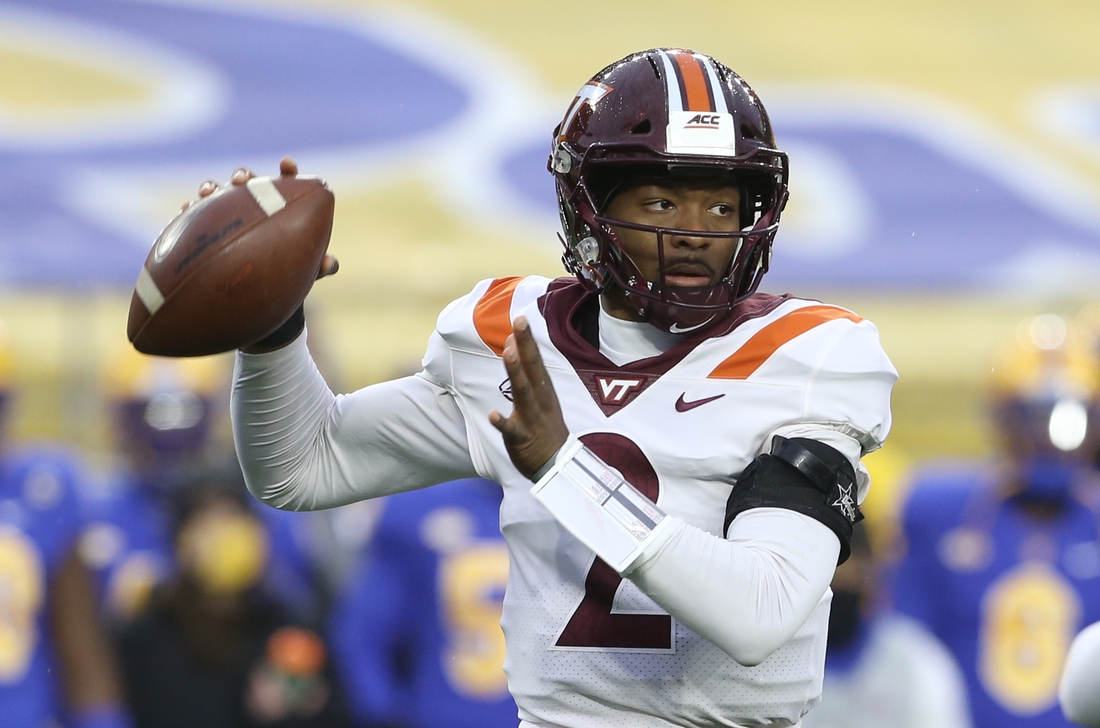 Nov 21, 2020; Pittsburgh, Pennsylvania, USA;  Virginia Tech Hokies quarterback Hendon Hooker (2) passes against the Pittsburgh Panthers during the first quarter at Heinz Field. Mandatory Credit: Charles LeClaire-USA TODAY Sports