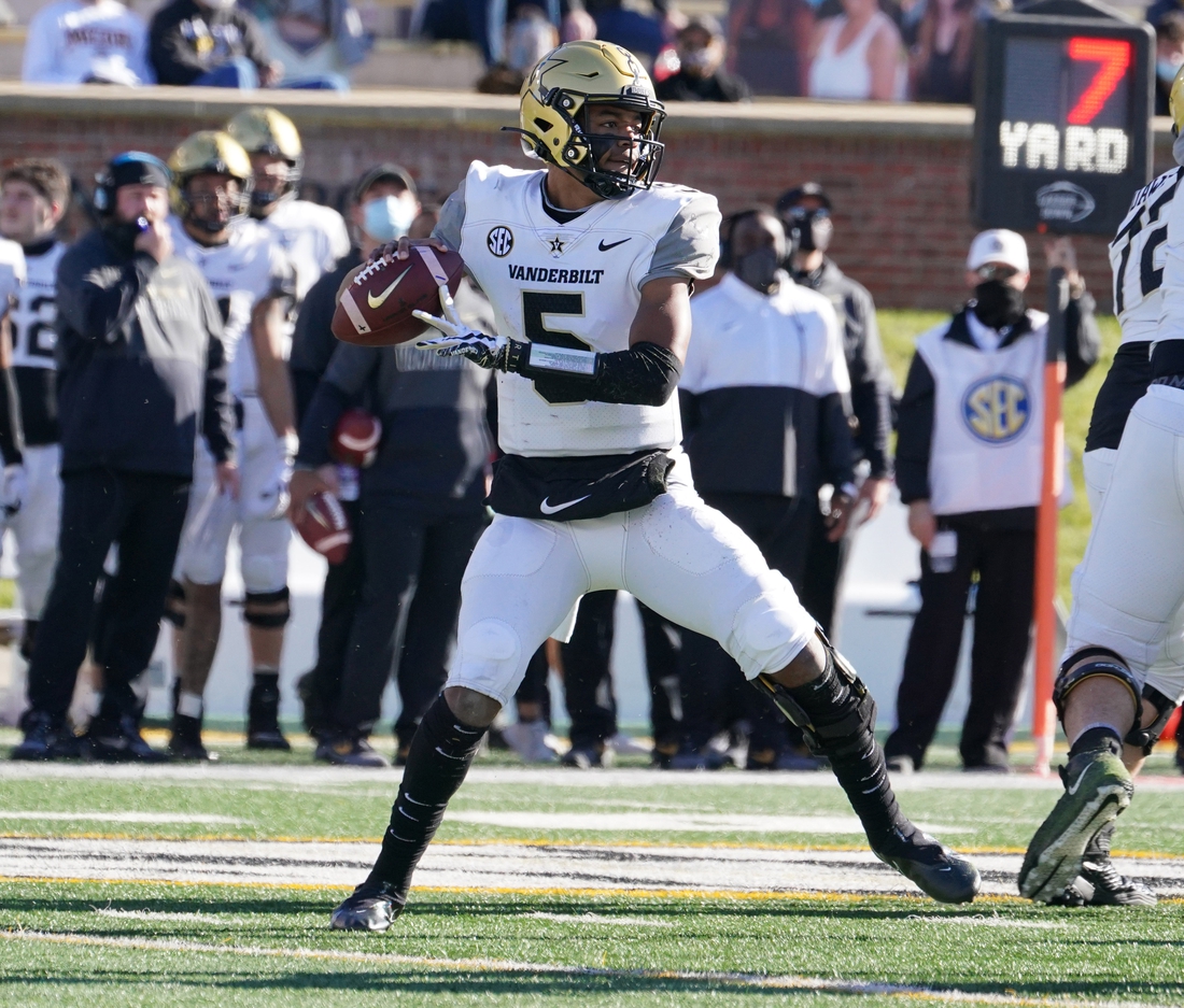 Nov 28, 2020; Columbia, Missouri, USA; Vanderbilt Commodores quarterback Mike Wright (5) drops back to pass during the game against the Missouri Tigers at Faurot Field at Memorial Stadium. Mandatory Credit: Denny Medley-USA TODAY Sports