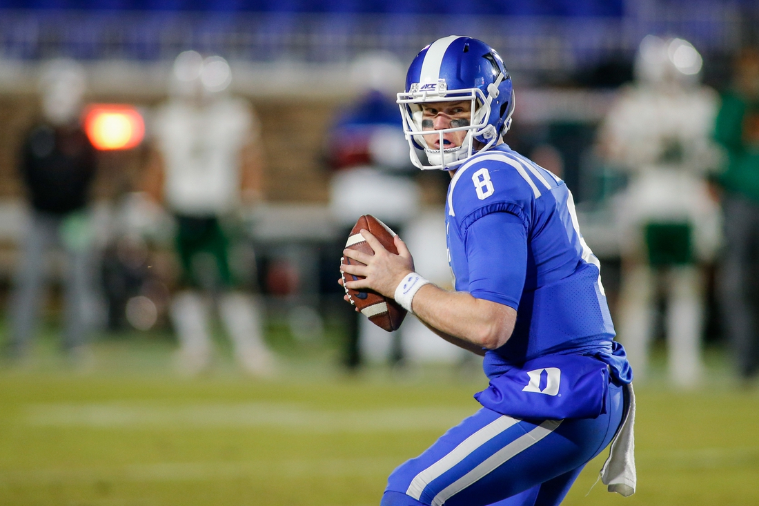 Dec 5, 2020; Durham, North Carolina, USA;  Duke Blue Devils quarterback Chase Brice (8) runs the offense against the Miami Hurricanes in the second half at Wallace Wade Stadium. The Miami Hurricanes won 48-0. Mandatory Credit: Nell Redmond-USA TODAY Sports