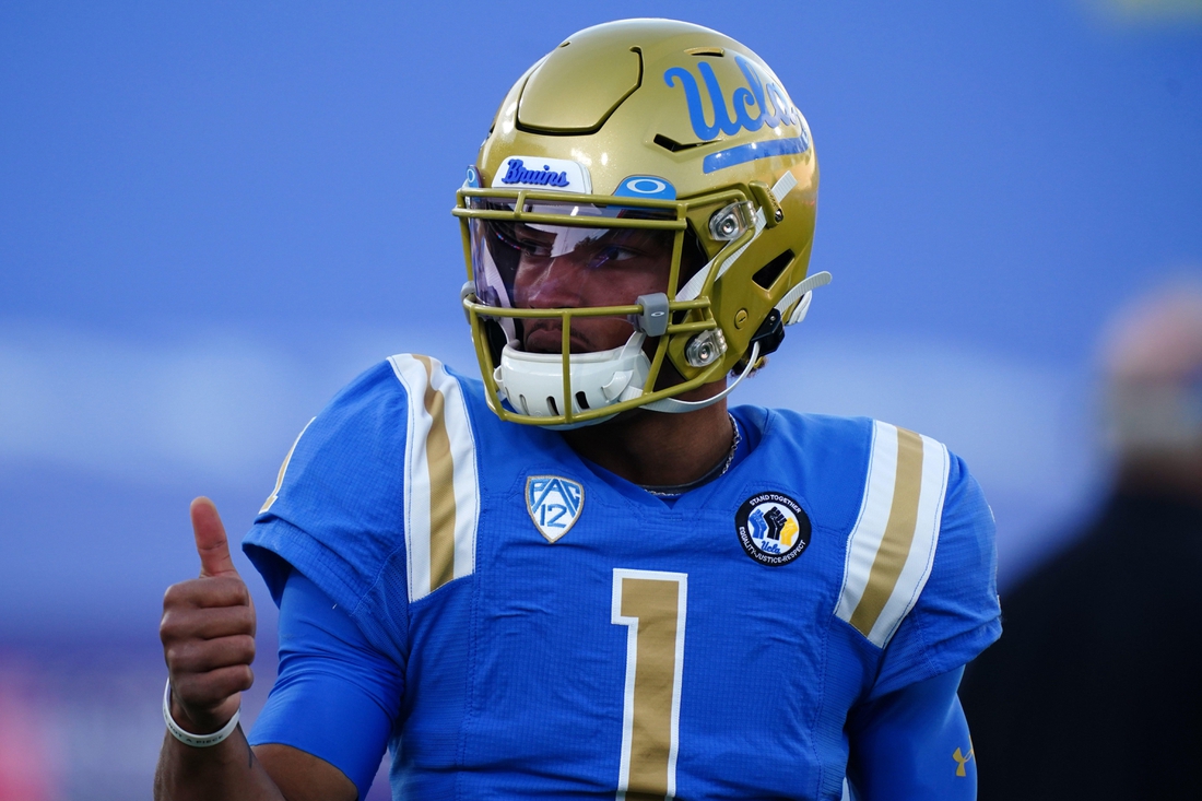 Dec 12, 2020; Pasadena, California, USA; UCLA Bruins quarterback Dorian Thompson-Robinson (1) reacts before the game against the Southern California Trojans at Rose Bowl. Mandatory Credit: Kirby Lee-USA TODAY Sports