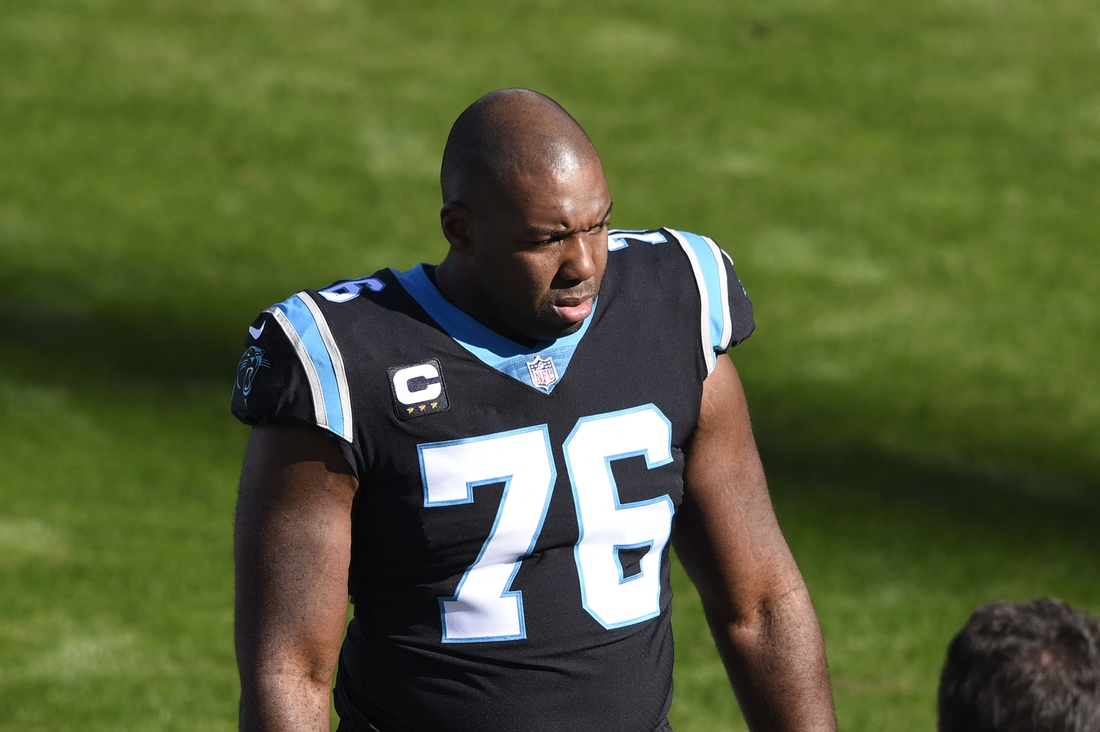 Dec 13, 2020; Charlotte, North Carolina, USA; Carolina Panthers offensive tackle Russell Okung (76) on to the field before the game at Bank of America Stadium. Mandatory Credit: Bob Donnan-USA TODAY Sports