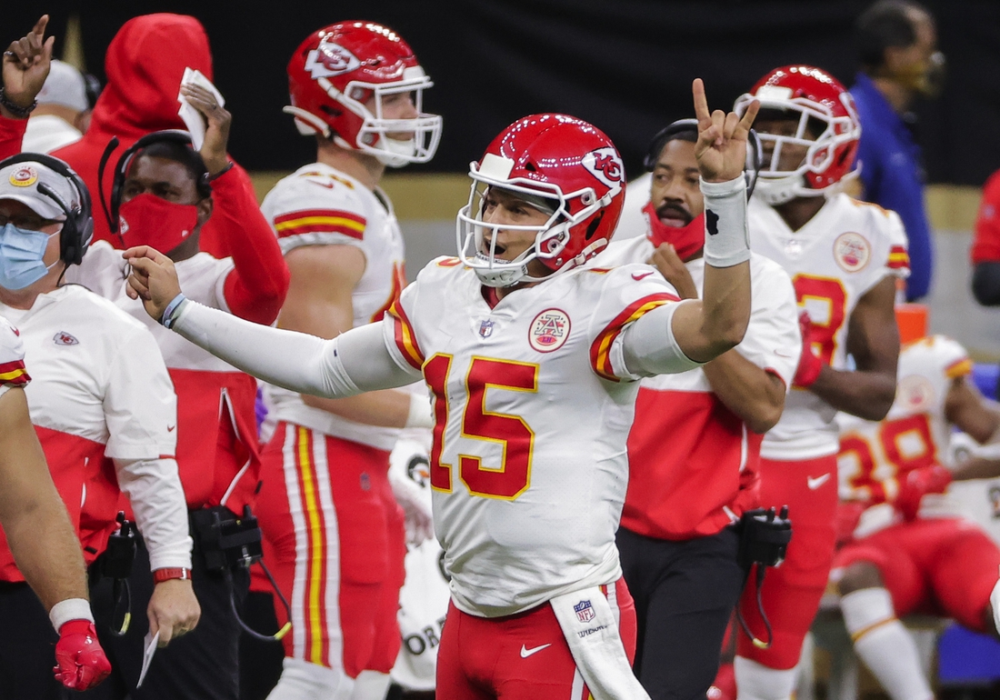 Dec 20, 2020; New Orleans, Louisiana, USA;  Kansas City Chiefs quarterback Patrick Mahomes (15) celebrates after a score against the New Orleans Saints during the second half at the Mercedes-Benz Superdome. Mandatory Credit: Derick E. Hingle-USA TODAY Sports