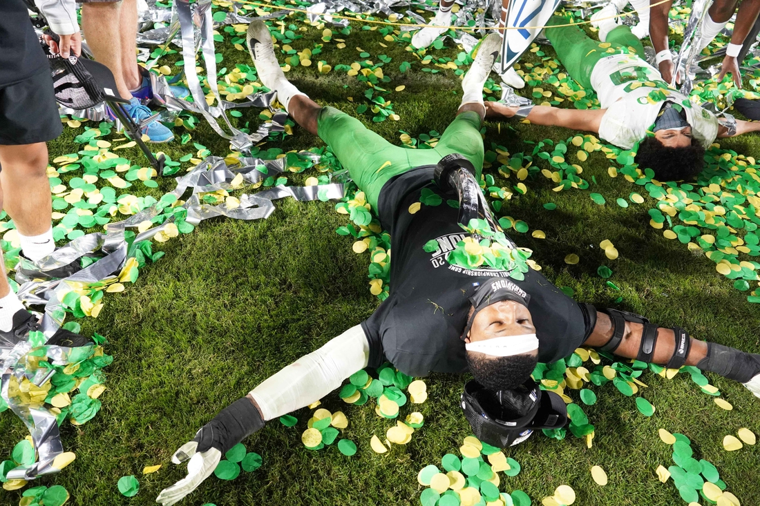 Dec 18, 2020; Los Angeles, California, USA; Oregon Ducks defensive end Kayvon Thibodeaux (5) celebrates after the Pac-12 Championship against the Southern California Trojans at United Airlines Field at Los Angeles Memorial Coliseum. Oregon defeated USC 31-24. Mandatory Credit: Kirby Lee-USA TODAY Sports