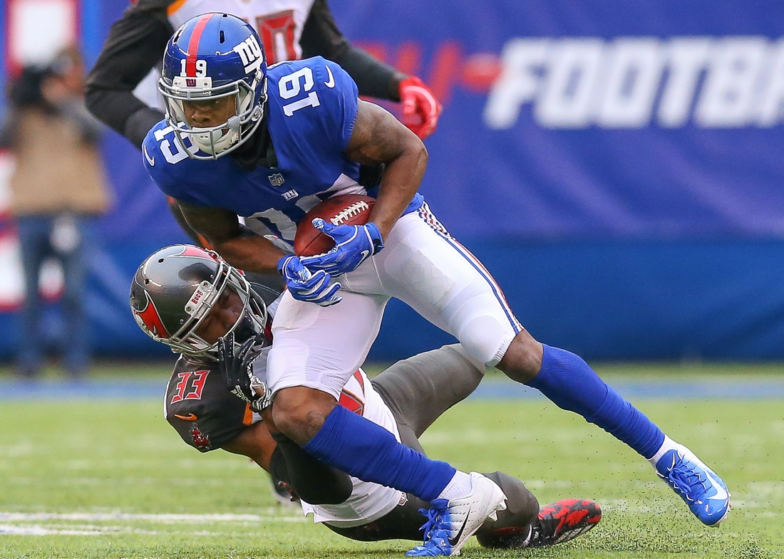 Nov 18, 2018; East Rutherford, NJ, USA; New York Giants wide receiver Corey Coleman (19) is tackled by Tampa Bay Buccaneers cornerback Carlton Davis (33) during the first half at MetLife Stadium. Mandatory Credit: Vincent Carchietta-USA TODAY Sports