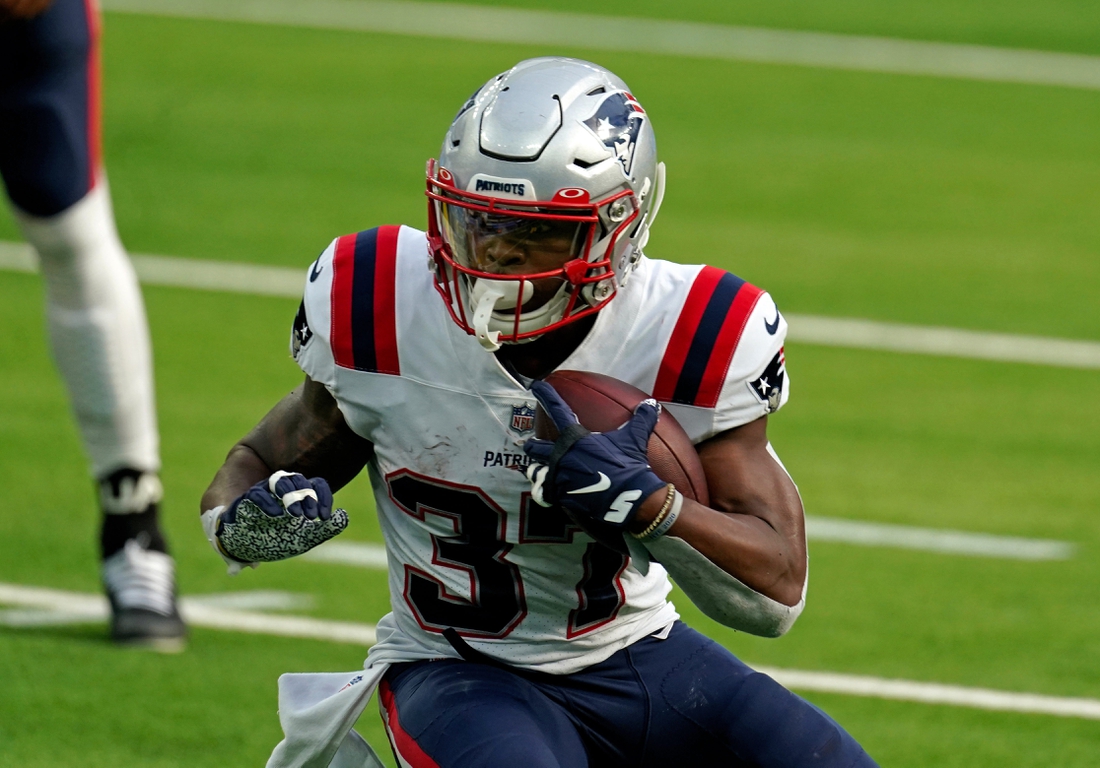 Dec 6, 2020; Inglewood, California, USA; New England Patriots running back Damien Harris (37) carries the ball against the Los Angeles Chargers during the first half at SoFi Stadium. Mandatory Credit: Kirby Lee-USA TODAY Sports