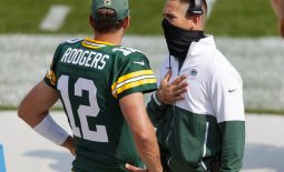 Sep 20, 2020; Green Bay, Wisconsin, USA;  Green Bay Packers quarterback Aaron Rodgers (12) talks with head coach Matt LaFleur during the third quarter of the game against the Detroit Lions at Lambeau Field. Mandatory Credit: Jeff Hanisch-USA TODAY Sports