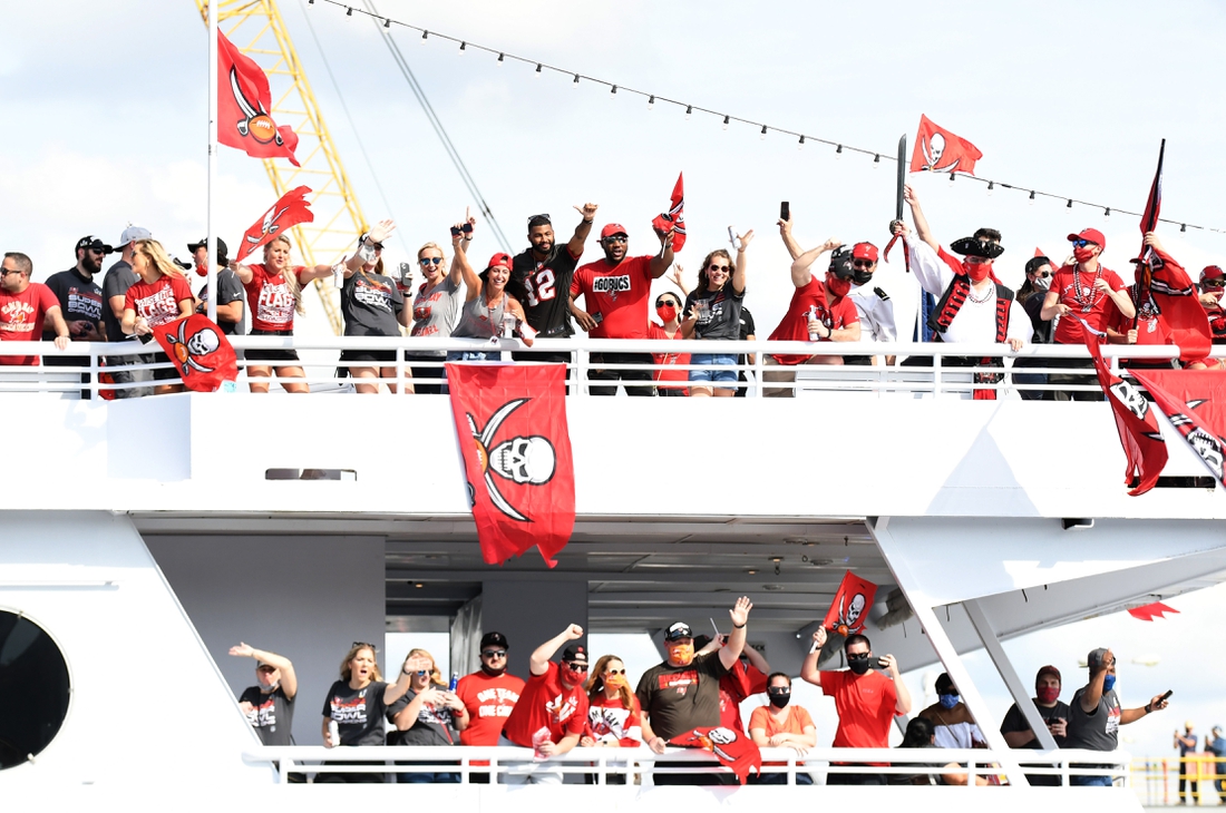 Feb 10, 2021; Tampa Bay, Florida, USA;   Tampa Bay Buccaneers celebrate during the  Tampa Bay Buccaneers boat parade to celebrate their victory over the Kansas City Chiefs in Super Bowl LV. Mandatory Credit: Jonathan Dyer-USA TODAY Sports
