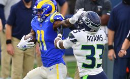 Nov 15, 2020; Inglewood, California, USA; Los Angeles Rams wide receiver Josh Reynolds (11) runs the ball against Seattle Seahawks strong safety Jamal Adams (33) during the first half at SoFi Stadium. Mandatory Credit: Gary A. Vasquez-USA TODAY Sports