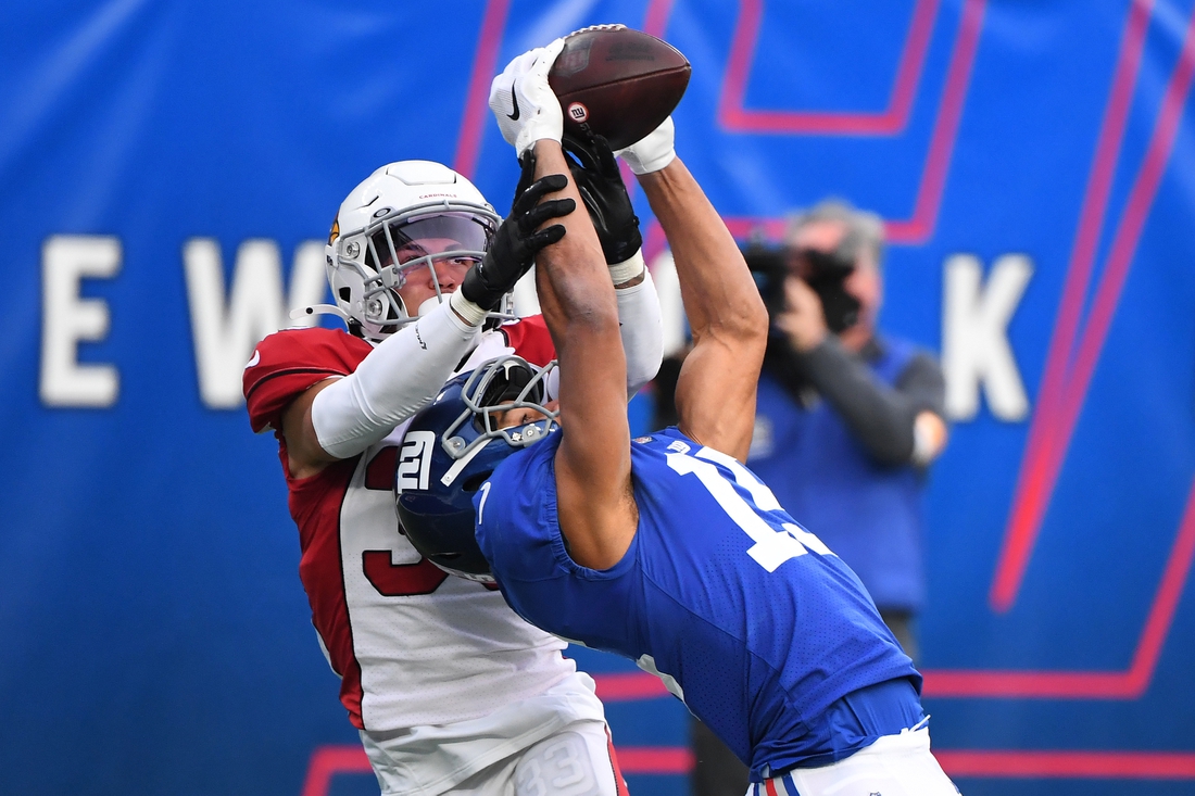 Dec 13, 2020; East Rutherford, New Jersey, USA; New York Giants wide receiver Golden Tate (15) catches a pass at the one yard line against Arizona Cardinals cornerback Byron Murphy Jr. (33) during the second half at MetLife Stadium. Mandatory Credit: Robert Deutsch-USA TODAY Sports