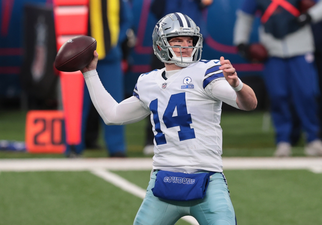 Jan 3, 2021; East Rutherford, NJ, USA; Dallas Cowboys quarterback Andy Dalton (14) throws a pass against the New York Giants in the first half at MetLife Stadium. Mandatory Credit: Vincent Carchietta-USA TODAY Sports