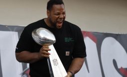 Feb 10, 2021; Tampa Bay, FL, USA;  Tampa Bay Buccaneers defensive end Ndamukong Suh holds the Vince Lombardi Trophy during a boat parade to celebrate victory in Super Bowl LV against the Kansas City Chiefs. Mandatory Credit: Kim Klement-USA TODAY Sports