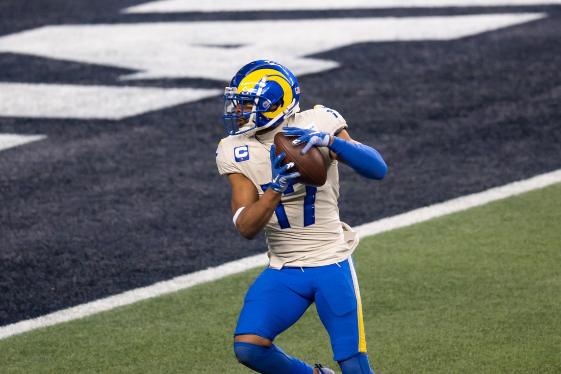 Jan 9, 2021; Seattle, Washington, USA; Los Angeles Rams wide receiver Robert Woods (17) scores a touchdown against the Seattle Seahawks during the second half at Lumen Field. Mandatory Credit: Steven Bisig-USA TODAY Sports