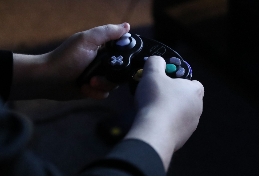 The hands of an esport gamer clutching the controler at Encore Esports Gaming Lounge in New Rochelle on Thursday, December 20, 2018. 

E Sports