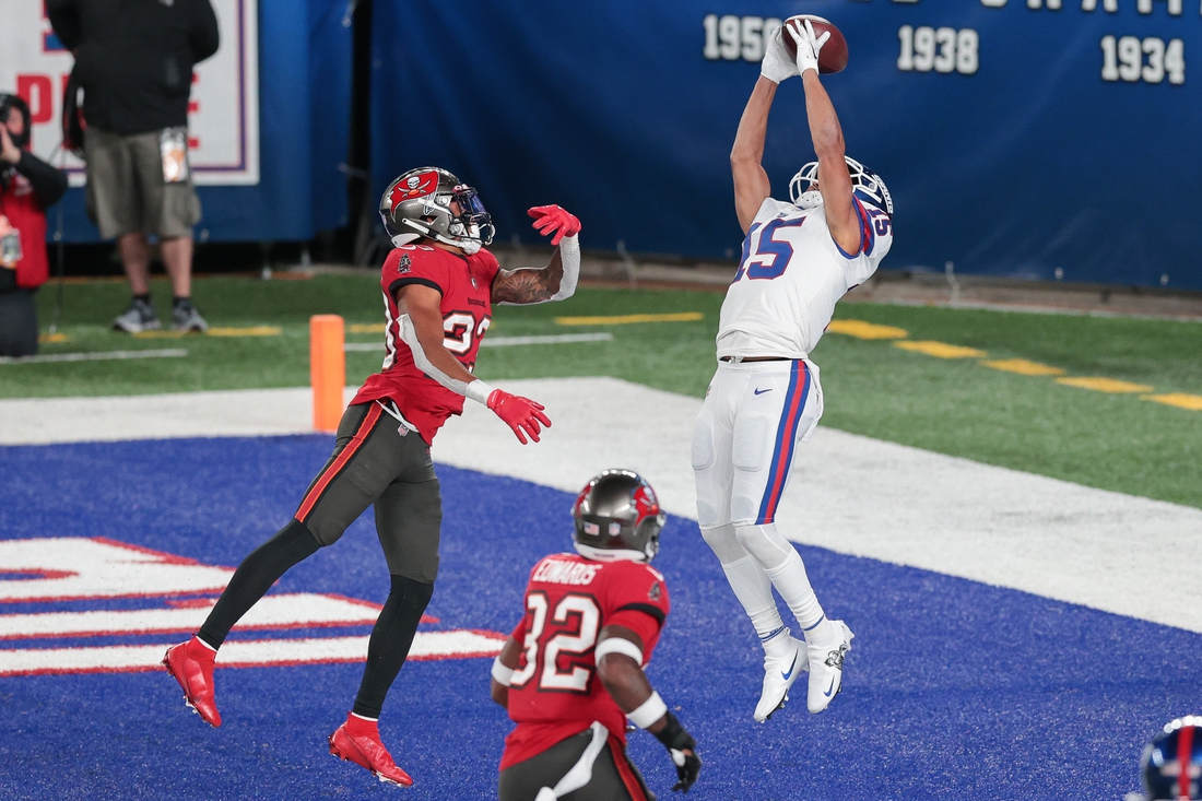 Nov 2, 2020; East Rutherford, New Jersey, USA; New York Giants wide receiver Golden Tate (15) catches a touchdown pass in front of Tampa Bay Buccaneers cornerback Sean Murphy-Bunting (23) during the second half at MetLife Stadium. Mandatory Credit: Vincent Carchietta-USA TODAY Sports