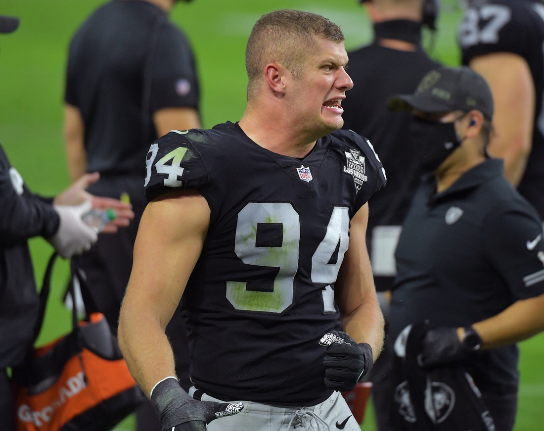 Nov 15, 2020; Paradise, Nevada, USA; Las Vegas Raiders defensive end Carl Nassib (94) reacts on the sidelines after a play against the Denver Broncos at Allegiant Stadium. Mandatory Credit: Stephen R. Sylvanie-USA TODAY Sports
