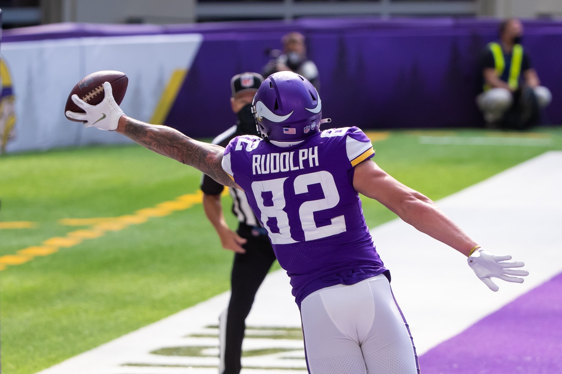 Sep 27, 2020; Minneapolis, Minnesota, USA; Minnesota Vikings tight end Kyle Rudolph (82) catches a pass for a touchdown in the fourth quarter against the Tennessee Titans at U.S. Bank Stadium. Mandatory Credit: Brad Rempel-USA TODAY Sports