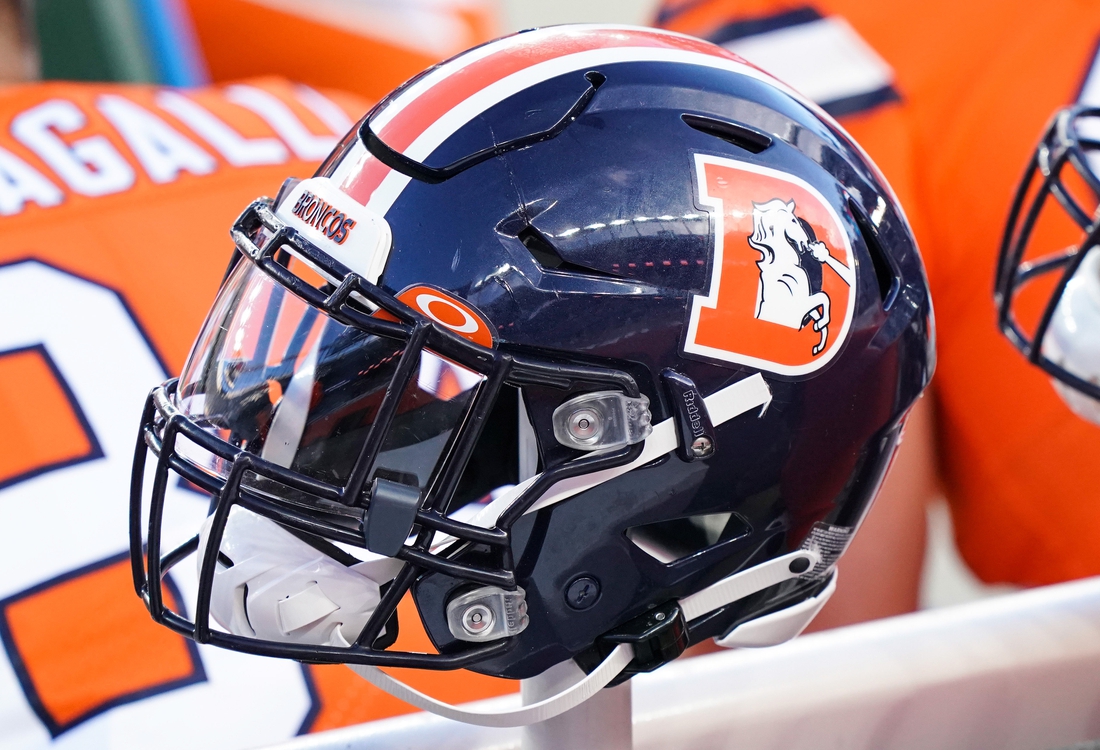 Dec 19, 2020; Denver, Colorado, USA; A general view of the Denver Broncos helmet on sidelines against the Buffalo Bills during the second quarter at Empower Field at Mile High. Mandatory Credit: Troy Babbitt-USA TODAY Sports