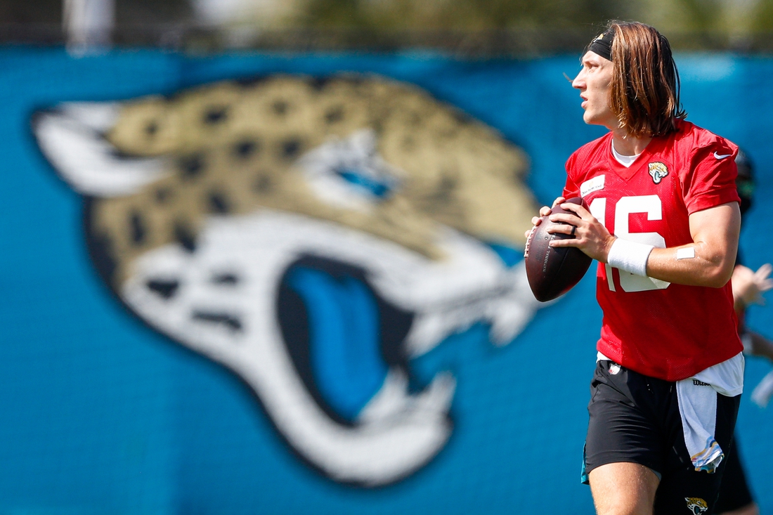 Jun 14, 2021; Jacksonville, Florida, USA;  Jacksonville Jaguars quarterback Trevor Lawrence (16) participates in drills during minicamp at Dream Finders Homes practice complex Mandatory Credit: Nathan Ray Seebeck-USA TODAY Sports