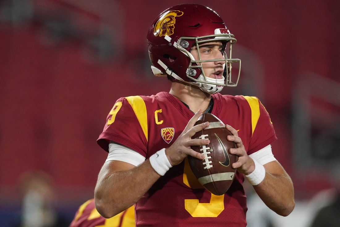 Dec 18, 2020; Los Angeles, California, USA; Southern California Trojans quarterback Kedon Slovis (9) throws the ball in the first quarter against the Oregon Ducks during the Pac-12 Championship at United Airlines Field at Los Angeles Memorial Coliseum. Mandatory Credit: Kirby Lee-USA TODAY Sports