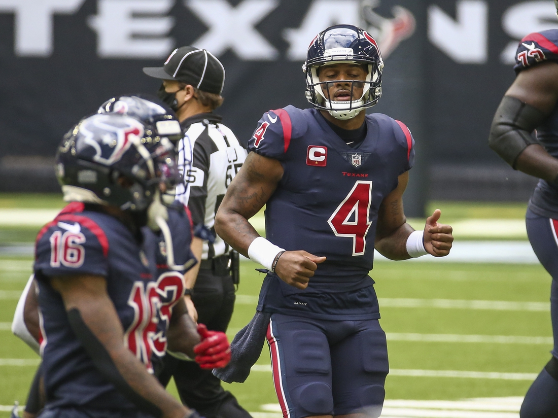Dec 27, 2020; Houston, Texas, USA; Houston Texans quarterback Deshaun Watson (4) jogs off the field after a play against the Cincinnati Bengals during the first quarter at NRG Stadium. Mandatory Credit: Troy Taormina-USA TODAY Sports