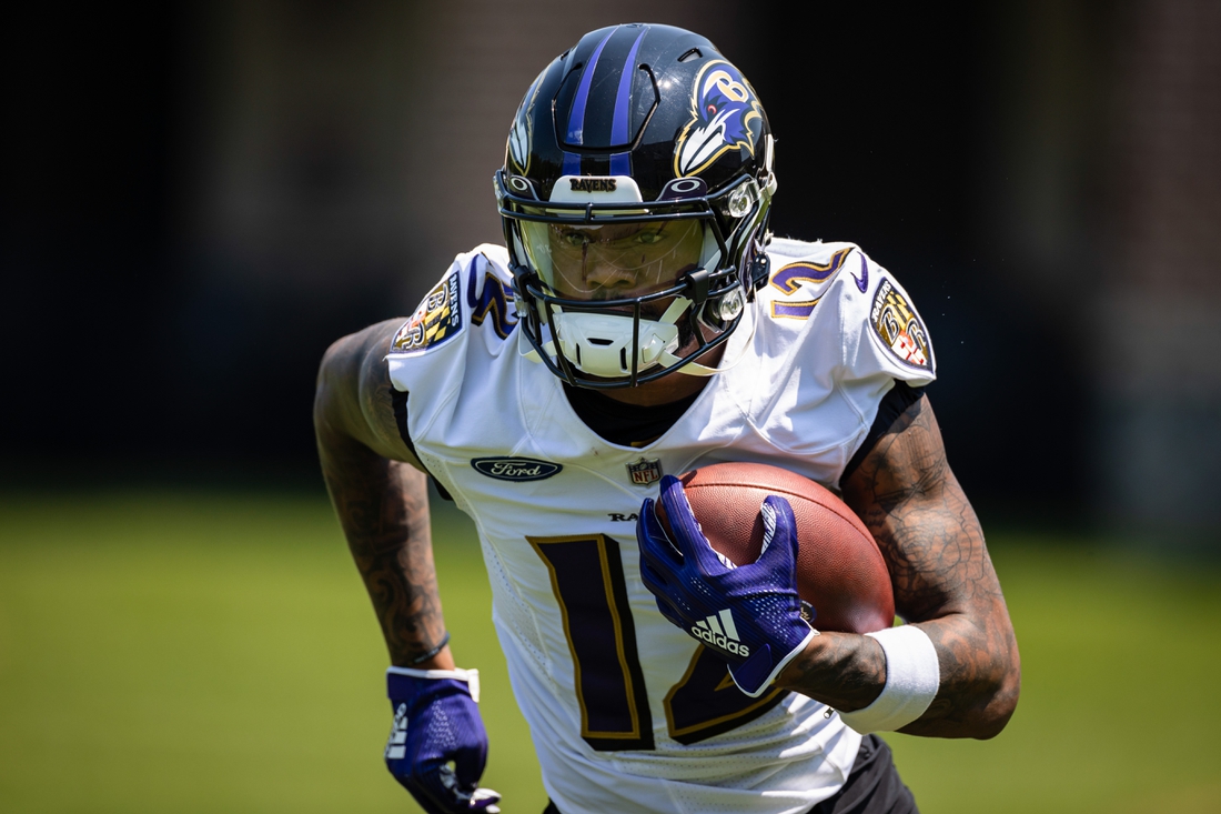May 26, 2021; Owings Mills, Maryland, USA; Baltimore Ravens wide receiver Rashod Bateman (12) in action during an OTA at Under Armour Performance Center. Mandatory Credit: Scott Taetsch-USA TODAY Sports