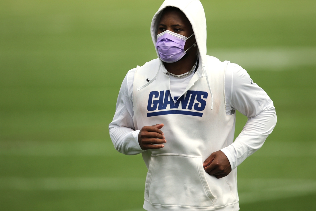 Running back Saquon Barkley jogs off the field at the end of Giants practice, in East Rutherford. Wednesday, July 28, 2021

Giants