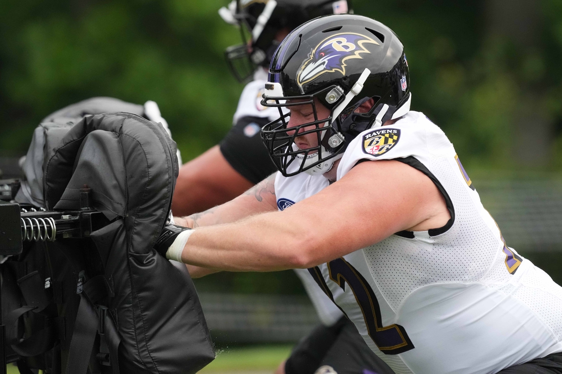 Jul 29, 2021; Owings Mills, MD, USA; Baltimore Ravens center Greg Mancz (72) practices drills at the Under Amour Performance Center. Mandatory Credit: Mitch Stringer-USA TODAY Sports