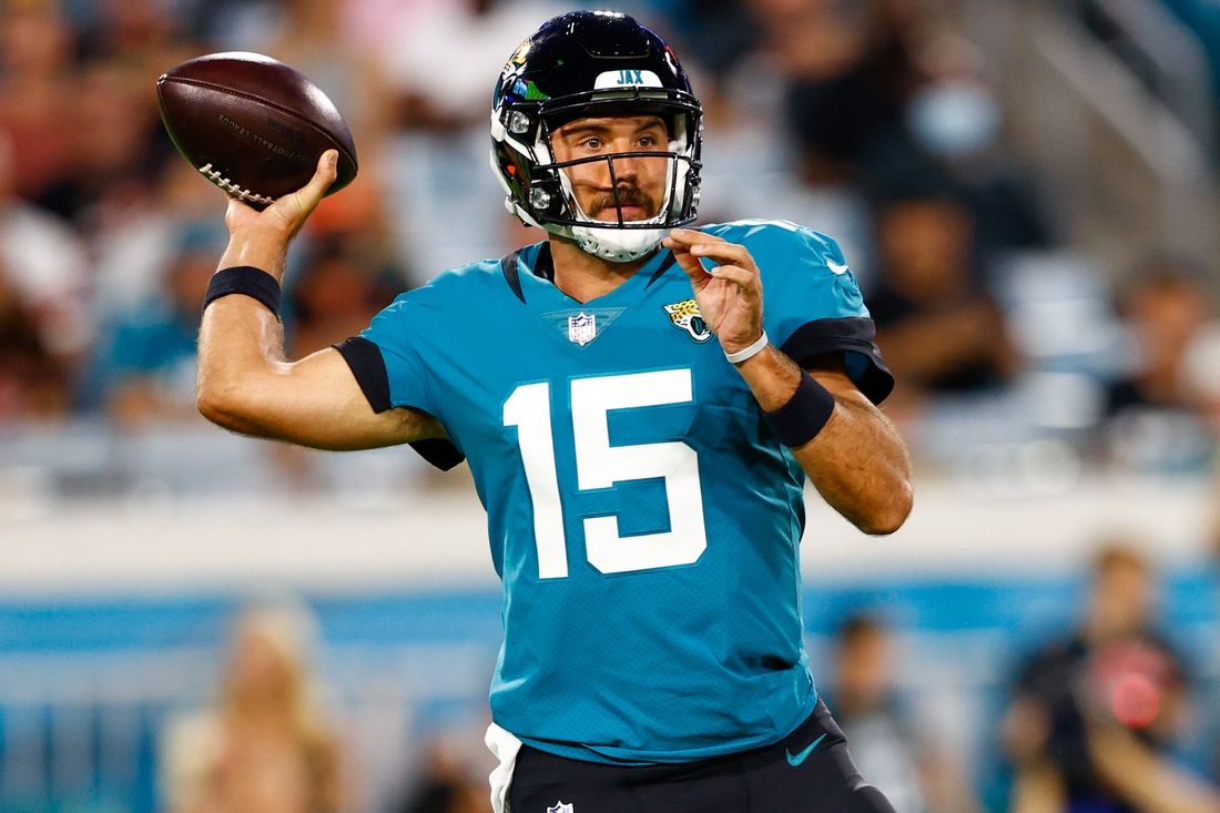 Aug 14, 2021; Jacksonville, Florida, USA;  Jacksonville Jaguars quarterback Gardner Minshew (15) throws a pass against the Cleveland Browns in the second quarter at TIAA Bank Field. Mandatory Credit: Nathan Ray Seebeck-USA TODAY Sports