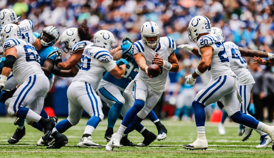 Indianapolis Colts quarterback Jacob Eason (9) hands the ball off to Indianapolis Colts running back Jordan Wilkins (20) on Sunday, Aug. 15, 2021, during a pre-season game between the Indianapolis Colts and the Carolina Panthers at Lucas Oil Stadium in Indianapolis.

Finals 17
