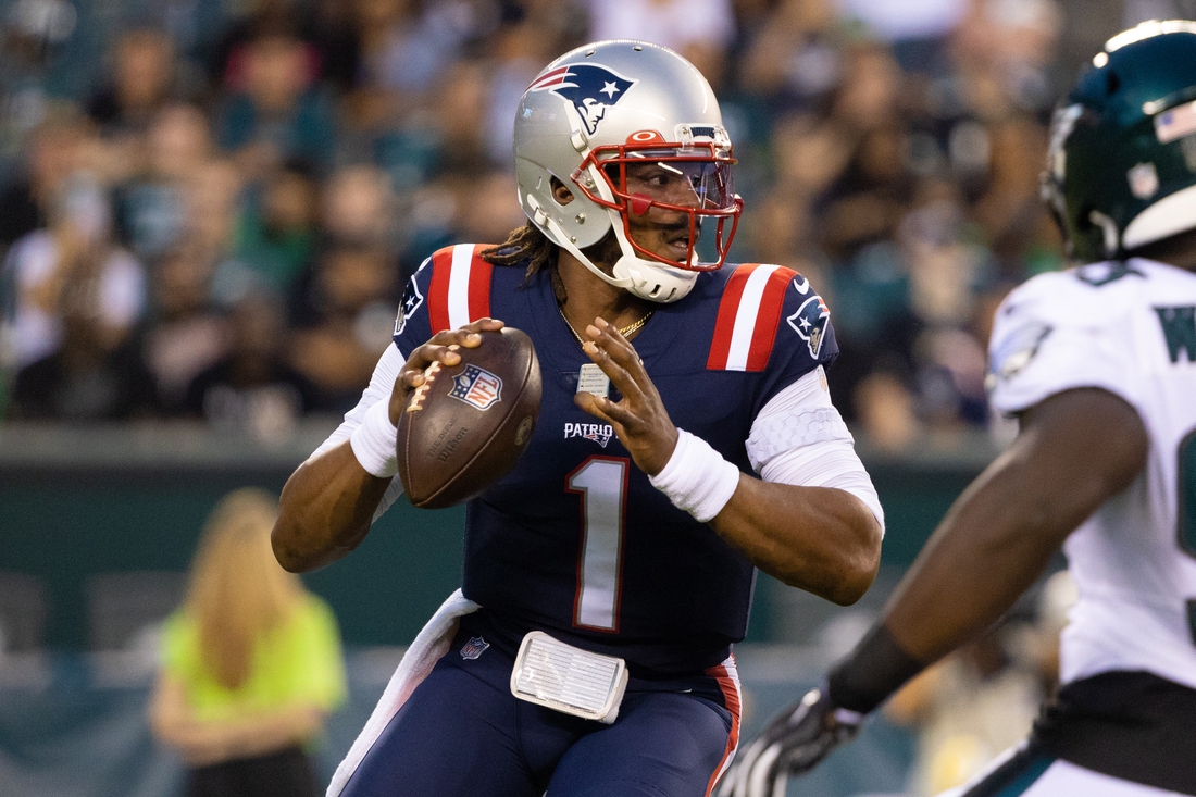 Aug 19, 2021; Philadelphia, Pennsylvania, USA; New England Patriots quarterback Cam Newton (1) drops back to pass against the Philadelphia Eagles during the first quarter at Lincoln Financial Field. Mandatory Credit: Bill Streicher-USA TODAY Sports