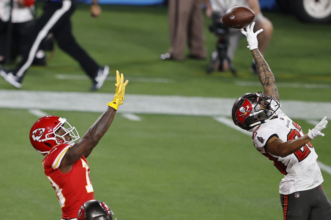 Feb 7, 2020; Tampa, FL, USA; Tampa Bay Buccaneers cornerback Sean Murphy-Bunting (23) knocks away a pass intended for Kansas City Chiefs wide receiver Byron Pringle (left) during the first quarter of Super Bowl LV at Raymond James Stadium.  Mandatory Credit: Kim Klement-USA TODAY Sports