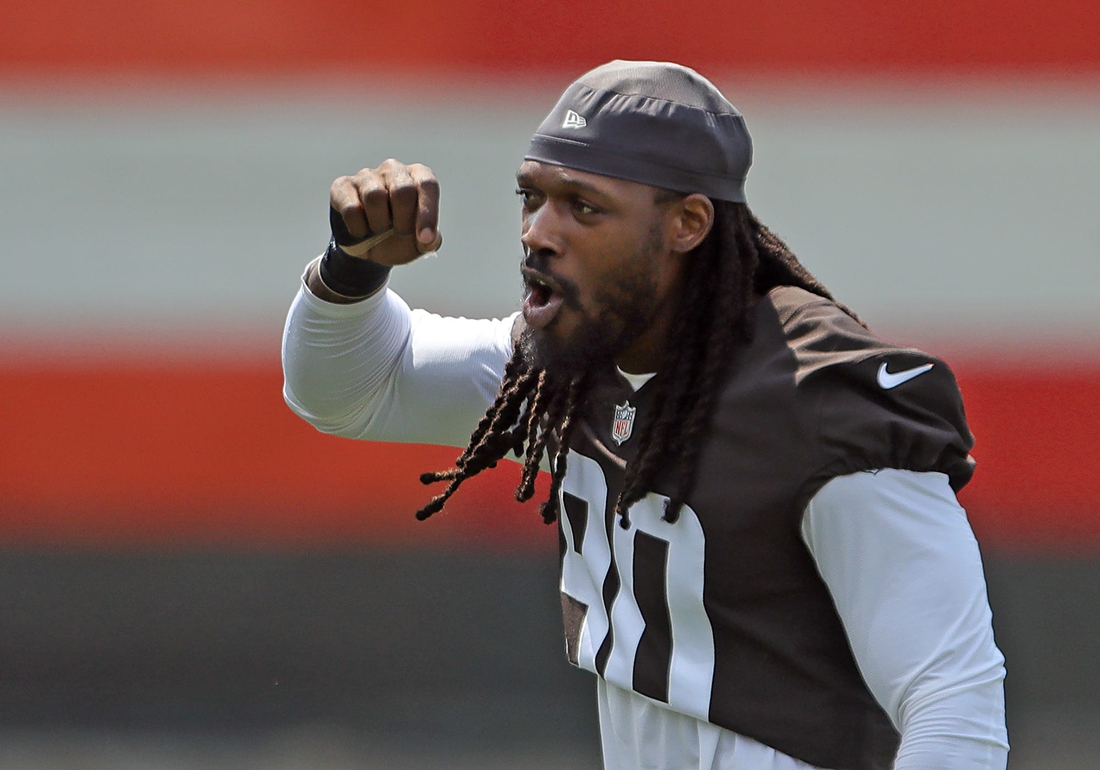 Cleveland Browns defensive end Jadeveon Clowney chants along with fans during NFL football training camp, Friday, July 30, 2021, in Berea, Ohio.

Brownscamp31 12