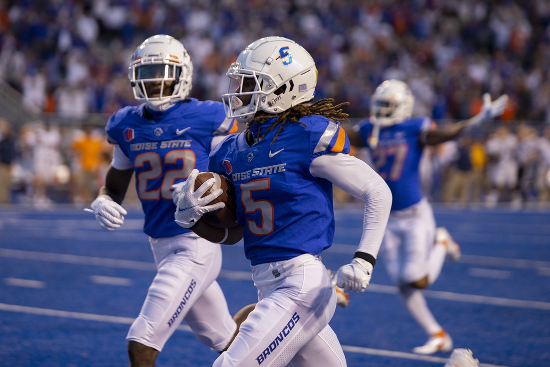 Sep 10, 2021; Boise, Idaho, USA; Boise State Broncos wide receiver Stefan Cobbs (5) returns a punt for a touchdown during the first half against the UTEP Miners at Albertsons Stadium. Mandatory Credit: Brian Losness-USA TODAY Sports