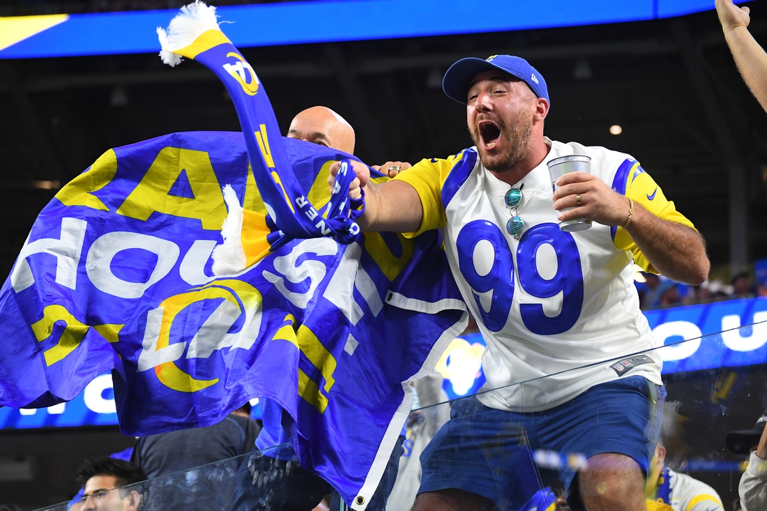 Sep 12, 2021; Inglewood, California, USA;   Los Angeles Rams fans celebrate after a touchdown in the second half against the Chicago Bears at SoFi Stadium. Mandatory Credit: Jayne Kamin-Oncea-USA TODAY Sports