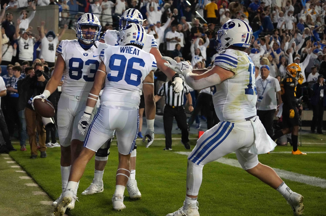 Sep 18, 2021; Provo, Utah, USA; BYU Cougars tight end Isaac Rex (83) celebrates with teammates after scoring on a 3-yard touchdown reception in the fourth quarter against the Arizona State Sun Devils at LaVell Edwards Stadium. Mandatory Credit: Kirby Lee-USA TODAY Sports