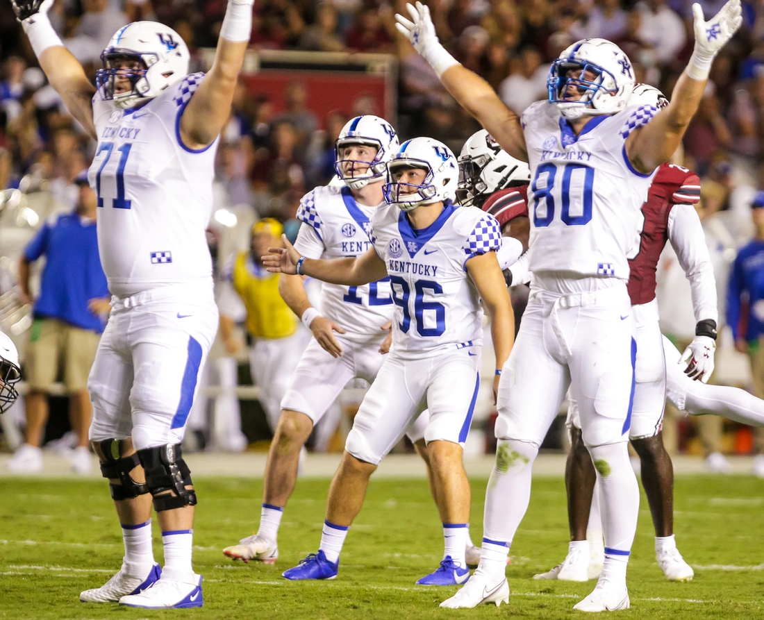 Sep 25, 2021; Columbia, South Carolina, USA; Kentucky Wildcats offensive tackle John Young (71) and tight end Brenden Bates (80) react after a successful field goal attempt by place kicker Matt Ruffolo (96) against the South Carolina Gamecocks in the second quarter at Williams-Brice Stadium. Mandatory Credit: Jeff Blake-USA TODAY Sports