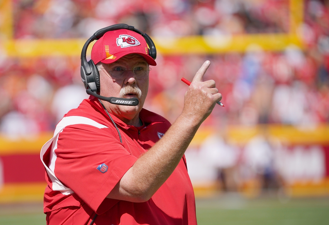 Sep 26, 2021; Kansas City, Missouri, USA; Kansas City Chiefs head coach Andy Reid motions to an official against the Los Angeles Chargers during the first half at GEHA Field at Arrowhead Stadium. Mandatory Credit: Denny Medley-USA TODAY Sports