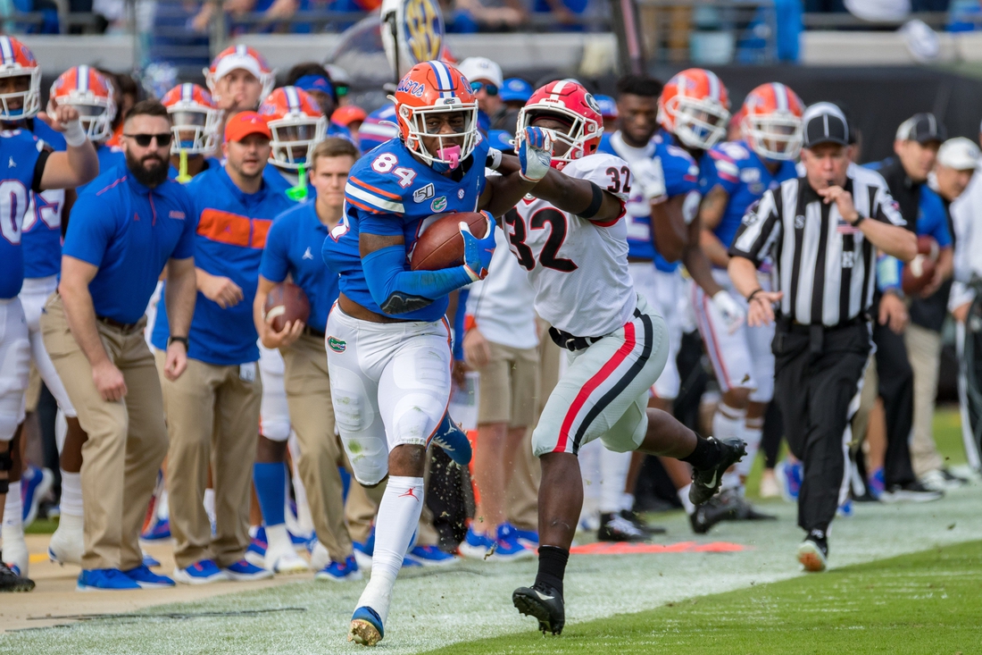 Florida Gators tight end Kyle Pitts (84) runs after a catch during the game featuring the #6 Florida Gators and the #8 Georgia Bulldogs at TIAA Bank Field in Jacksonville, FL on Saturday, November 2, 2019. [Matt Pendleton/Correspondent]

Fl Gai 1102 Flgagamer 4318