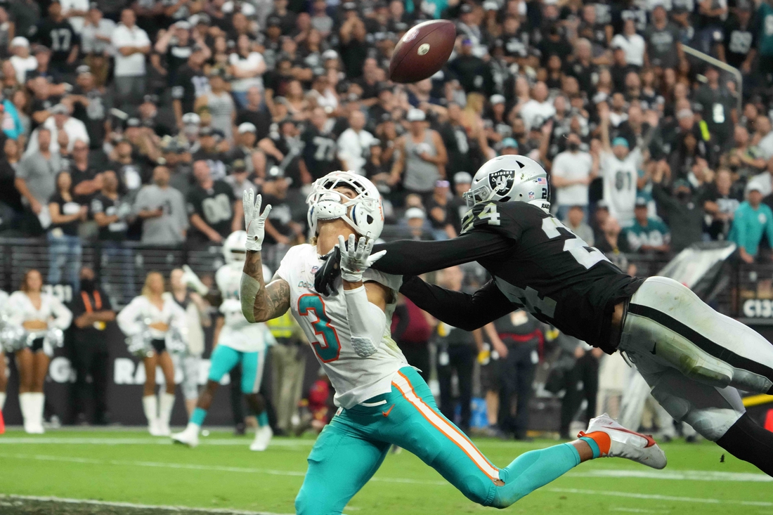 Sep 26, 2021; Paradise, Nevada, USA; Miami Dolphins wide receiver Will Fuller (3) is defended by Las Vegas Raiders defensive back Johnathan Abram (24) in overtime at Allegiant Stadium.The Raiders defeated the Dolphins 31-28 in overtime. Mandatory Credit: Kirby Lee-USA TODAY Sports