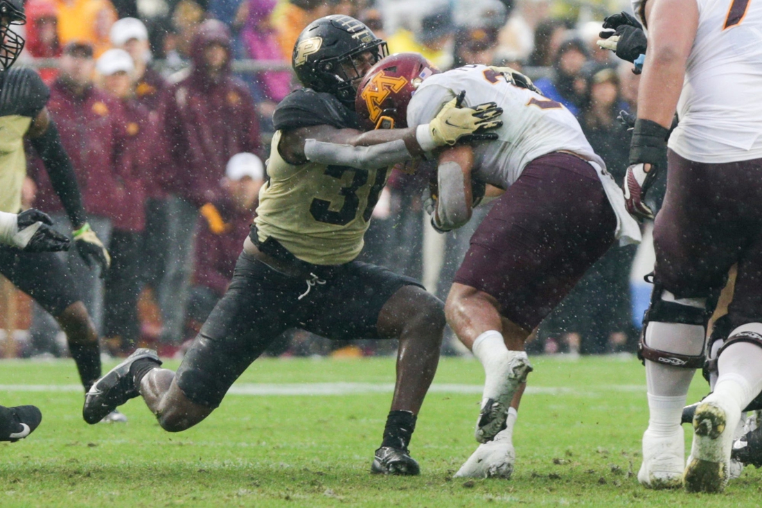 Purdue linebacker Jaylan Alexander (36) tackles Minnesota running back Trey Potts (3) during the third quarter of an NCAA college football game, Saturday, Oct. 2, 2021 at Ross-Ade Stadium in West Lafayette, Ind.

Cfb Purdue Vs Minnesota