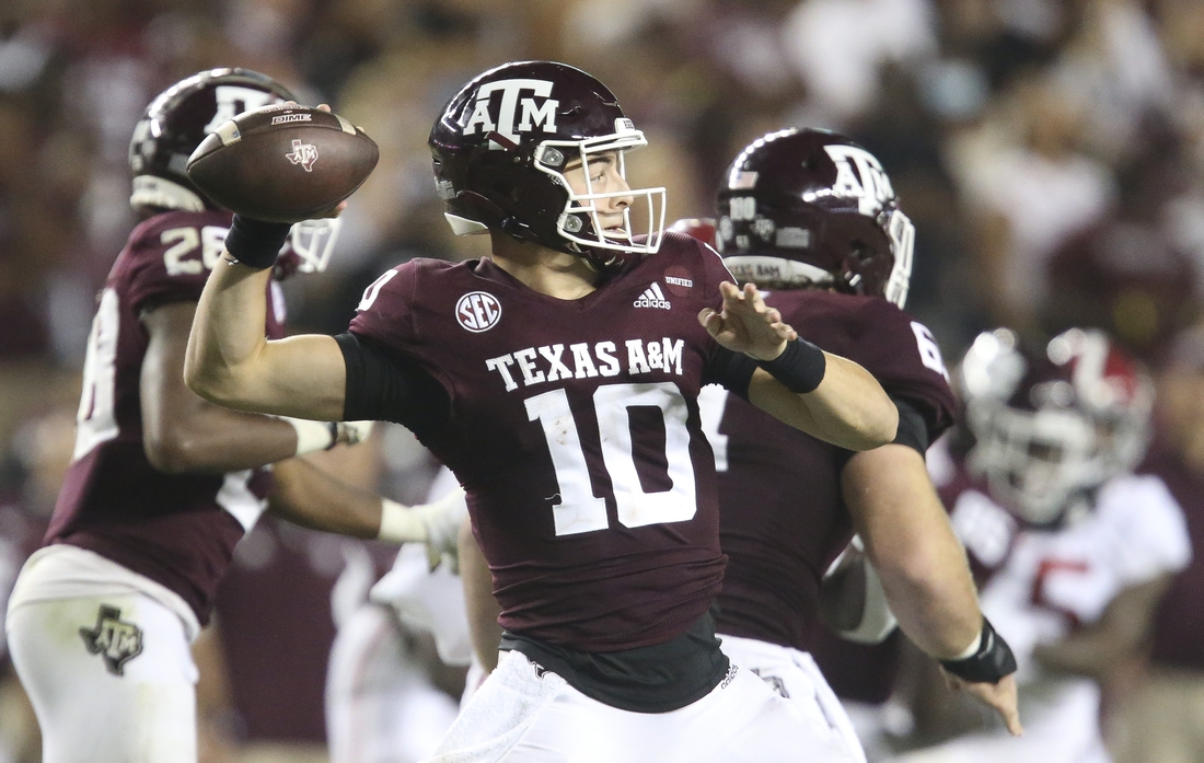 Oct 9, 2021; College Station, Texas, USA;  Texas A&M quarterback Zach Calzada (10) throws a pass against Alabama at Kyle Field. Texas A&M defeated Alabama 41-38 on a field goal as time expired. Mandatory Credit: Gary Cosby Jr.-USA TODAY Sports