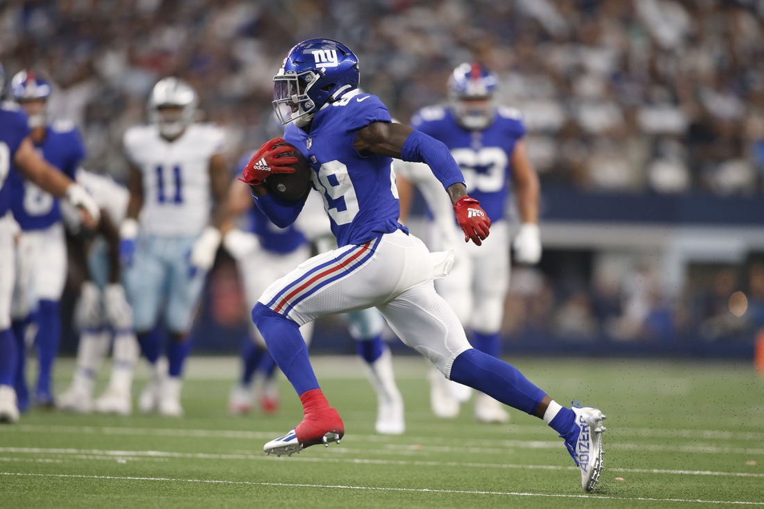 Oct 10, 2021; Arlington, Texas, USA; New York Giants wide receiver Kadarius Toney (89) runs after making a catch in the second quarter against the Dallas Cowboys at AT&T Stadium. Mandatory Credit: Tim Heitman-USA TODAY Sports