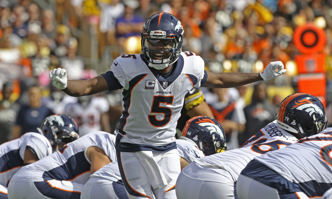 Oct 10, 2021; Pittsburgh, Pennsylvania, USA;  Denver Broncos quarterback Teddy Bridgewater (5) calls an audible at the line of scrimmage against the Pittsburgh Steelers during the first quarter at Heinz Field. Mandatory Credit: Charles LeClaire-USA TODAY Sports
