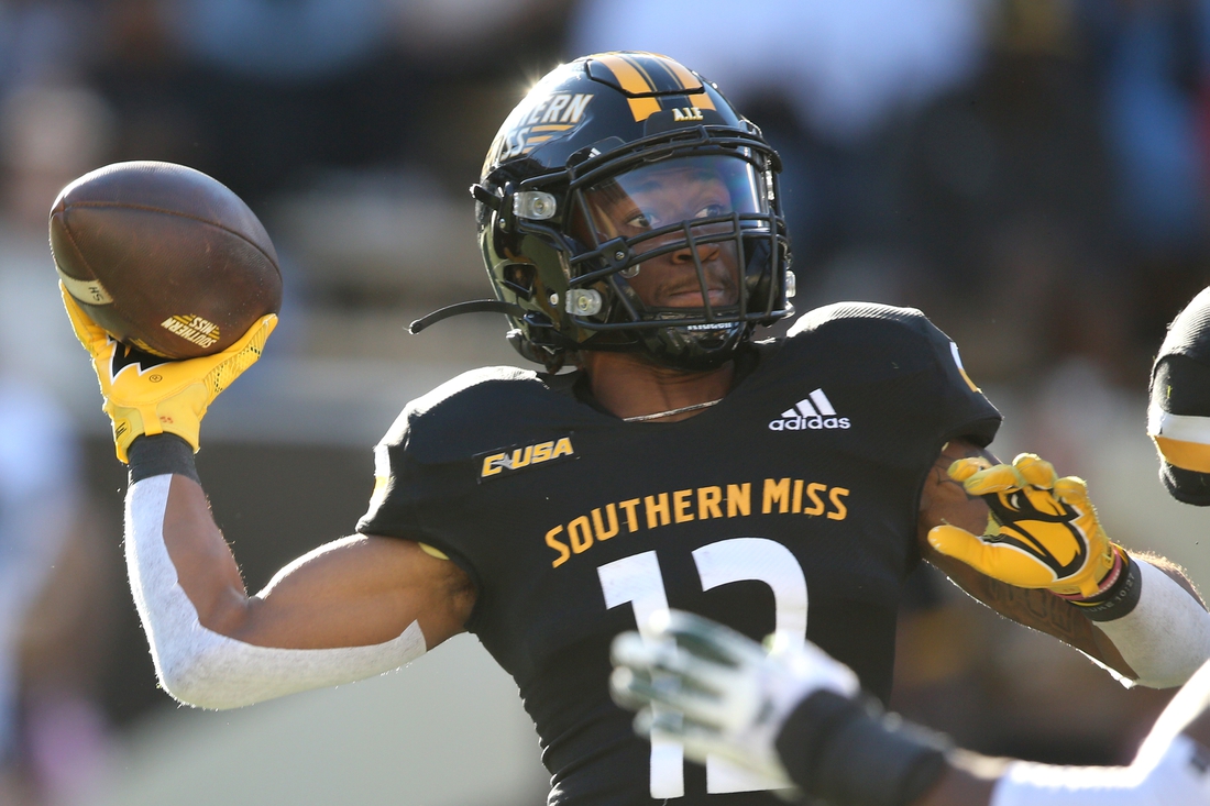 Oct 16, 2021; Hattiesburg, Mississippi, USA; Southern Miss Golden Eagles quarterback Chandler Pittman (12) looks to throw a pass in the second half against the UAB Blazers at M.M. Roberts Stadium. Mandatory Credit: Chuck Cook-USA TODAY Sports