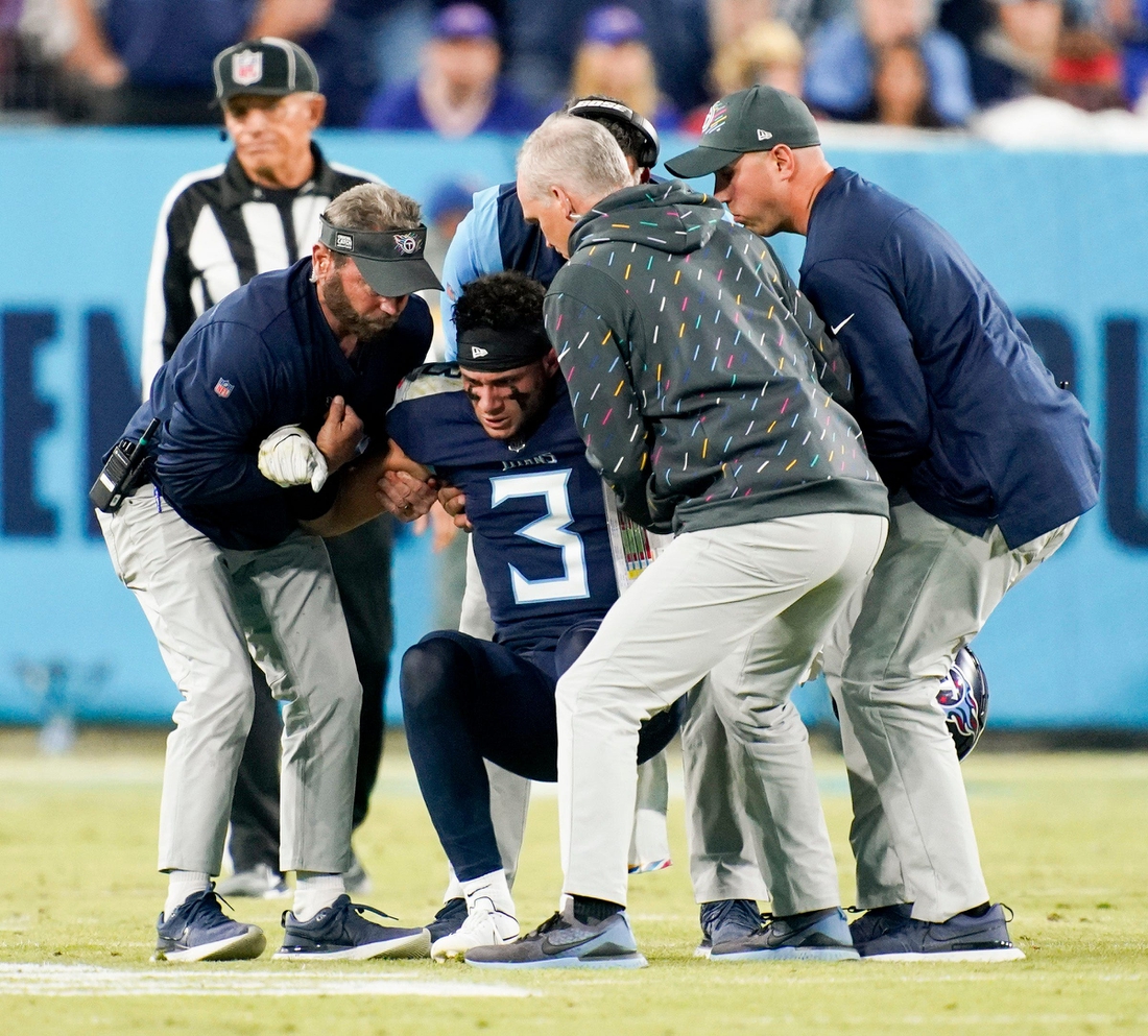 Tennessee Titans cornerback Caleb Farley (3) is helped up after he was injured at Nissan Stadium Monday, Oct. 18, 2021 in Nashville, Tenn.