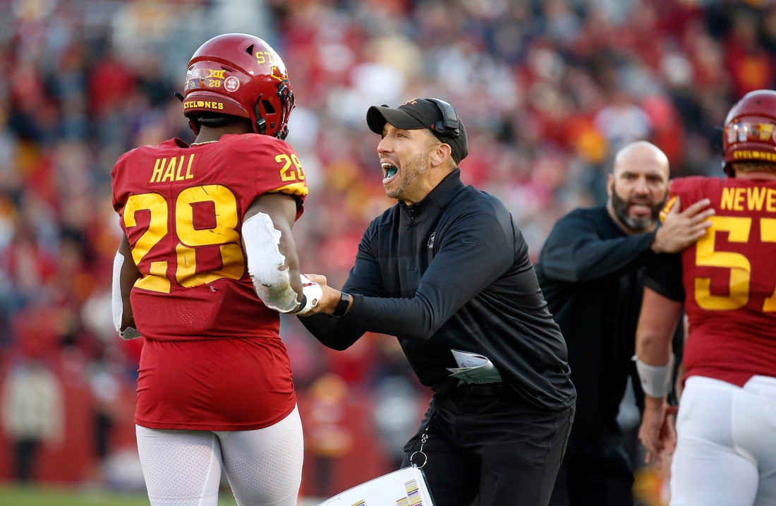 Iowa State head football coach Matt Campbell celebrates with running back Breece Hall after Hall scored a touchdown in the fourth quarter to help the Cyclones upset No. 8-ranked Oklahoma State on Saturday, Oct. 23, 2021, at Jack Trice Stadium in Ames.

20211023 Iowastatevsokst