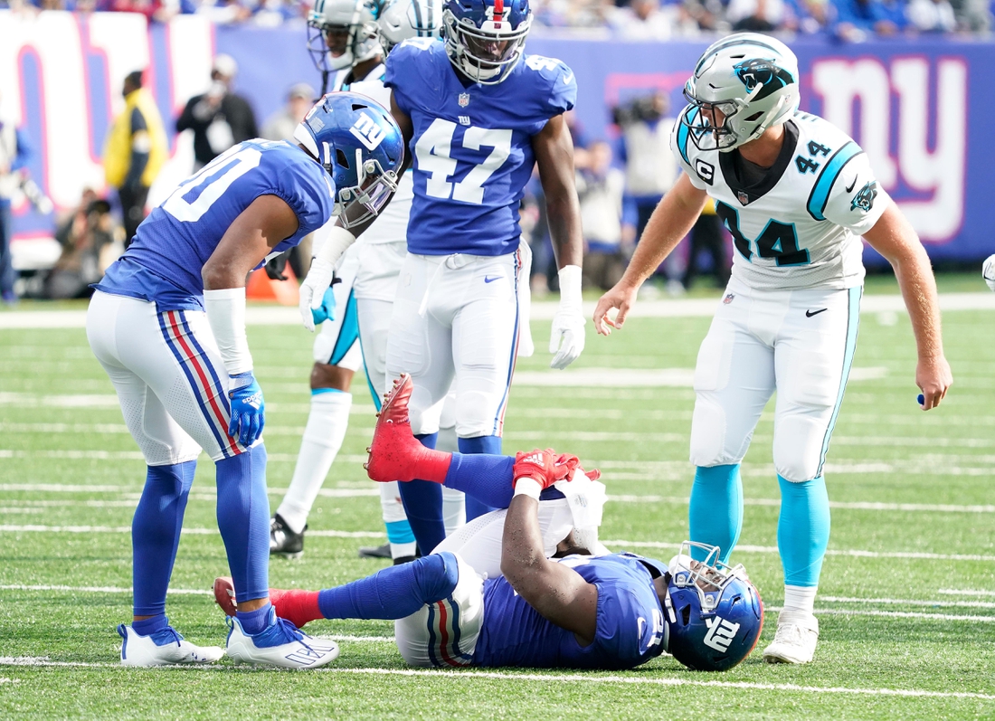 Oct 24, 2021; East Rutherford, NJ, USA;  New York Giants free safety Jabrill Peppers (21) is injured in the second half against the Carolina Panthers at MetLife Stadium. Mandatory Credit: Robert Deutsch-USA TODAY Sports